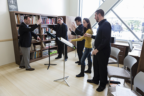 Frost faculty and students practicing together in a studio